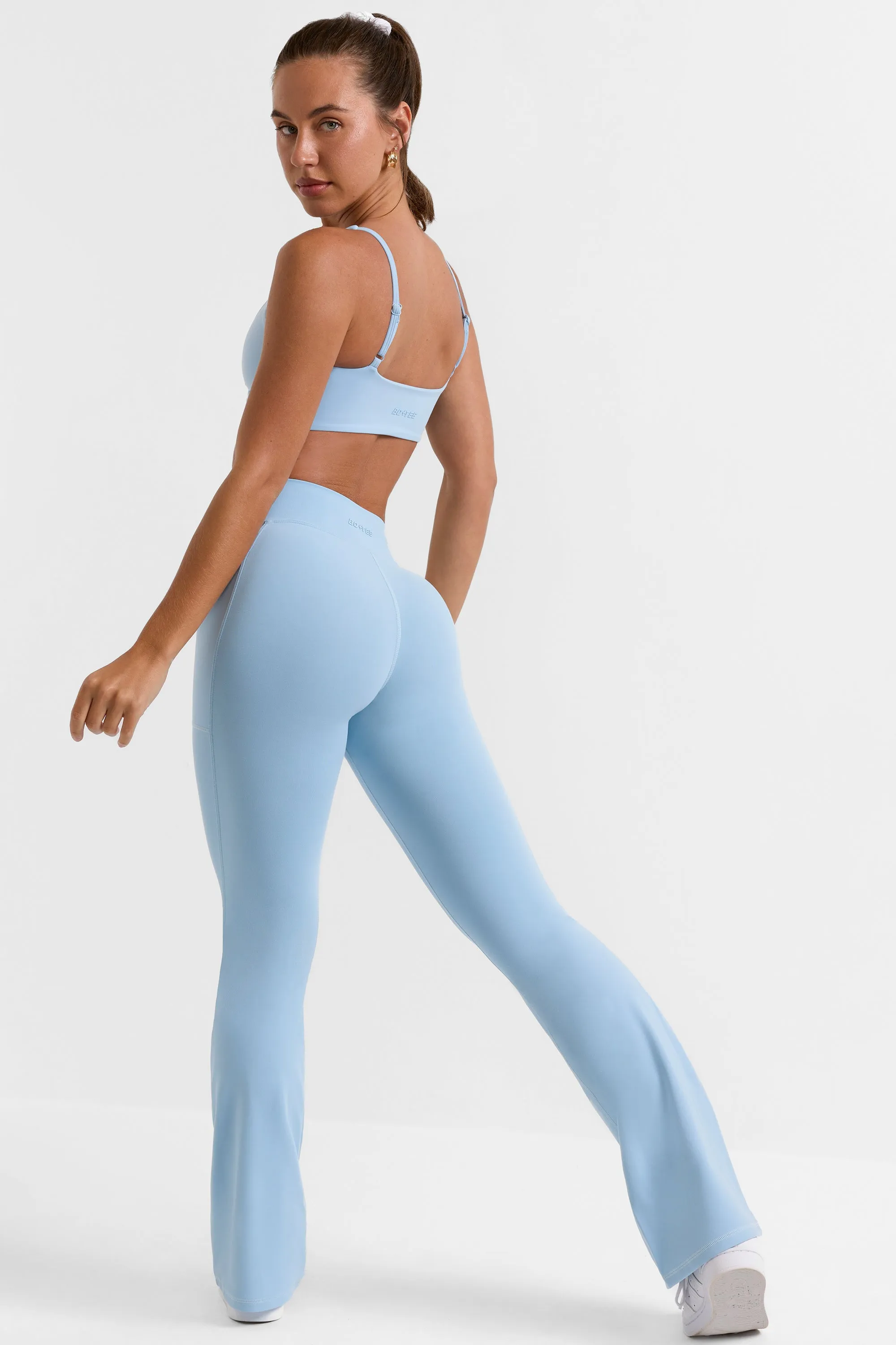 Cross Waistband Flare Pocket Leggings in Ice Blue